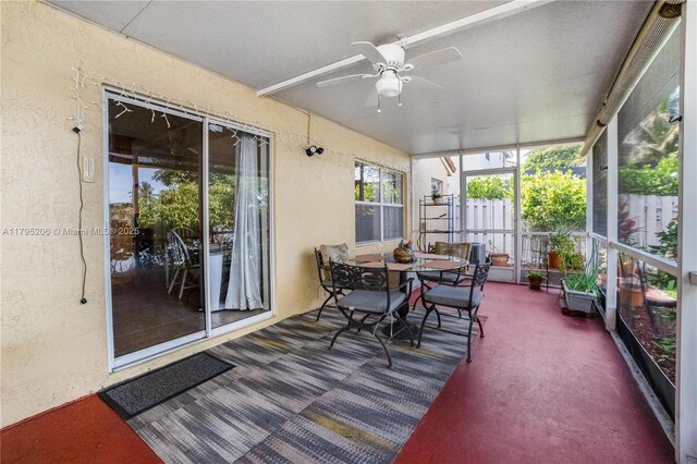 1249 NW 126th Ter, Sunrise, FL 33323 - sunroom featuring ceiling fan and outdoor dining area