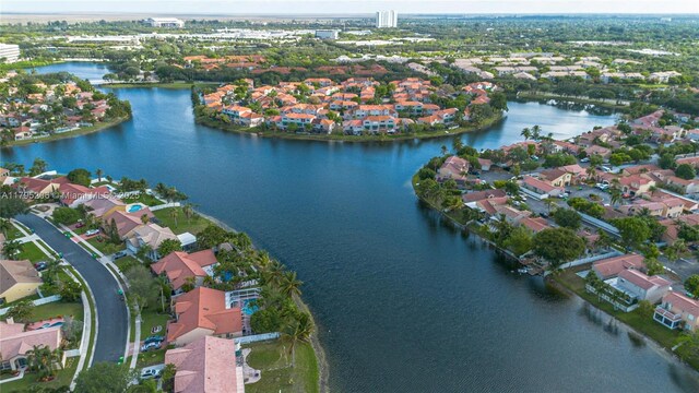 1249 NW 126th Ter, Sunrise, FL 33323 - aerial overview of property's location with nearby suburban area and a nearby body of water