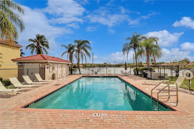 1249 NW 126th Ter, Sunrise, FL 33323 - community pool featuring a patio