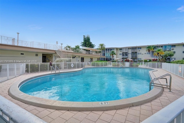 pool featuring fence