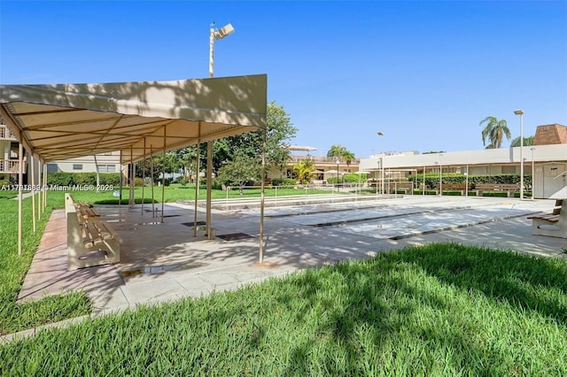 view of home's community with shuffleboard
