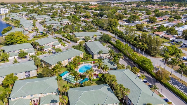 birds eye view of property with a residential view