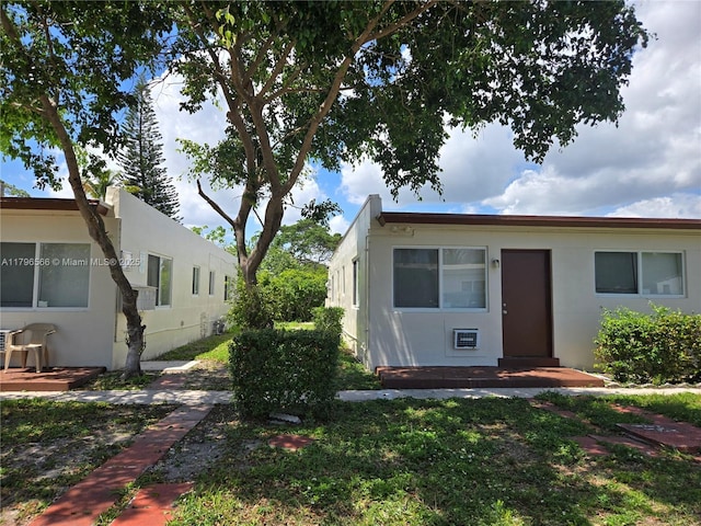 exterior space with stucco siding