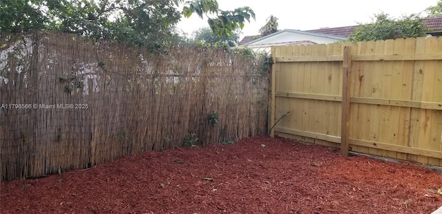 view of yard featuring fence