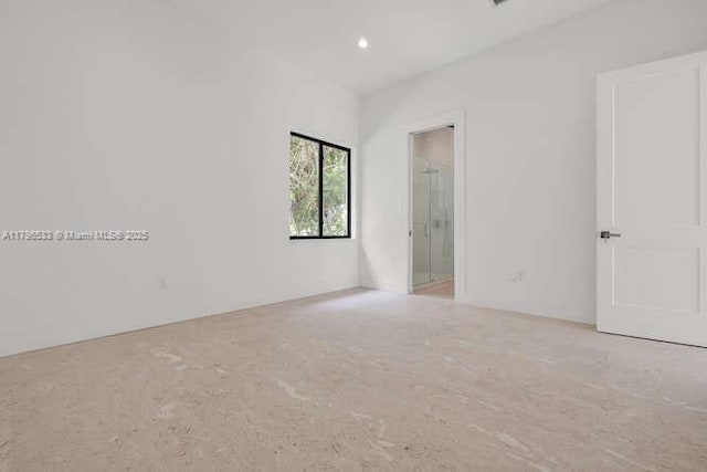 empty room featuring recessed lighting