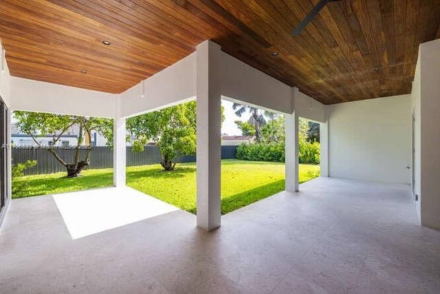 view of patio featuring fence