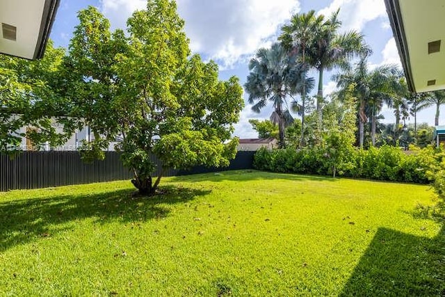view of yard with fence