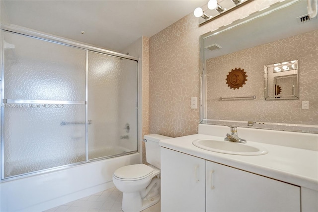 full bathroom with wallpapered walls, toilet, visible vents, and vanity
