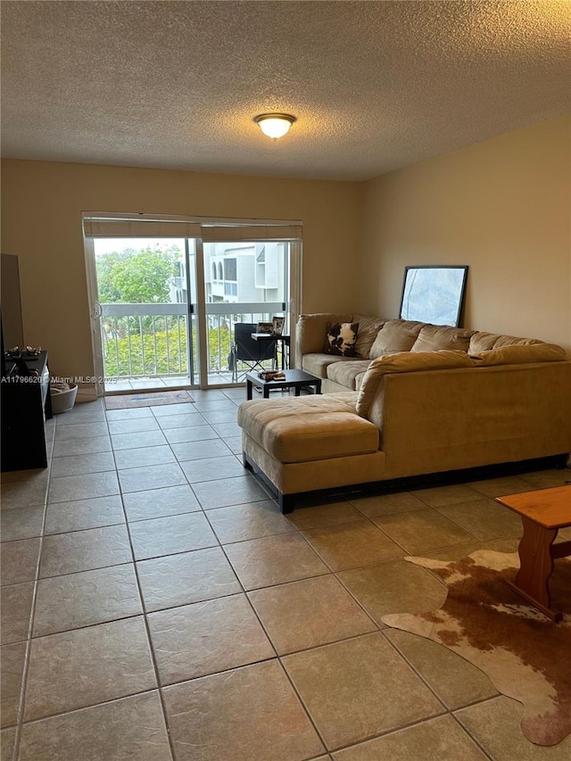 tiled living room with a textured ceiling