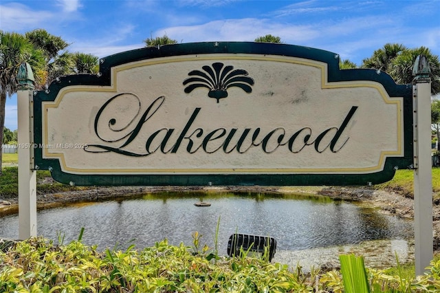 8215 NW 85th Ave, Tamarac, FL 33321 - community / neighborhood sign featuring a water view