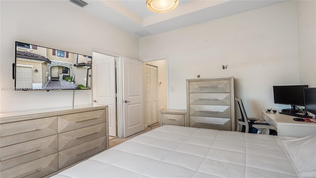 bedroom featuring visible vents