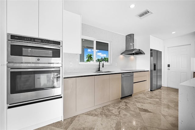 5510 NE 18th Ave, Fort Lauderdale, FL 33334 - kitchen featuring a sink, island exhaust hood, visible vents, light countertops, and appliances with stainless steel finishes