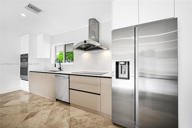 5510 NE 18th Ave, Fort Lauderdale, FL 33334 - kitchen featuring visible vents, a sink, extractor fan, stainless steel appliances, and white cabinets