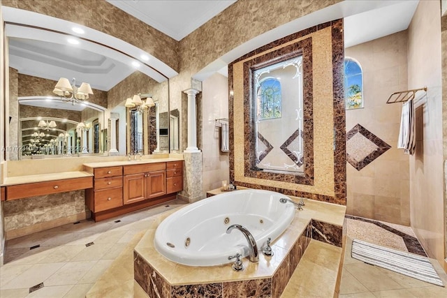 full bath featuring decorative columns, vanity, crown molding, a jetted tub, and a walk in shower