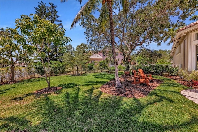 view of yard with a fenced backyard