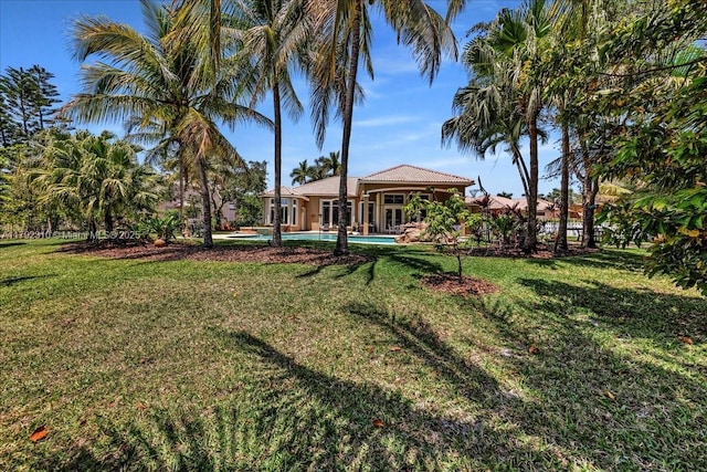 view of yard with an outdoor pool