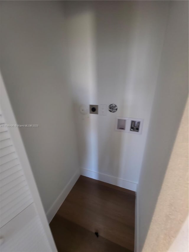 washroom featuring baseboards, hookup for a washing machine, wood finished floors, hookup for an electric dryer, and laundry area