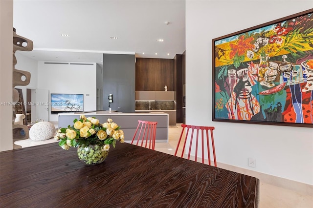 dining room with recessed lighting