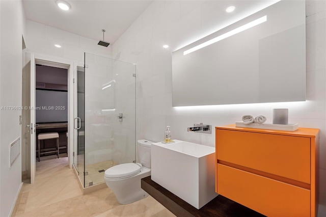 bathroom with a stall shower, recessed lighting, toilet, visible vents, and vanity