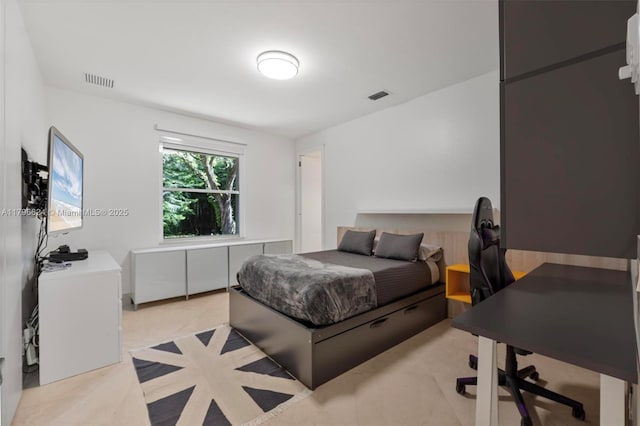 bedroom featuring visible vents