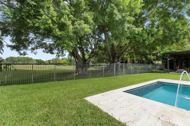 view of pool with a fenced backyard, a patio, a fenced in pool, and a lawn