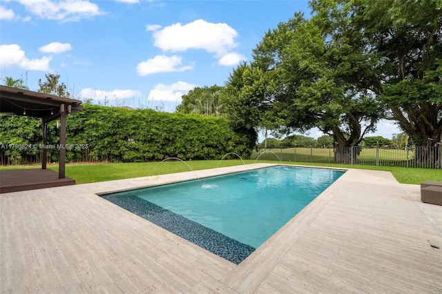 view of swimming pool featuring fence, a patio, a fenced in pool, and a lawn