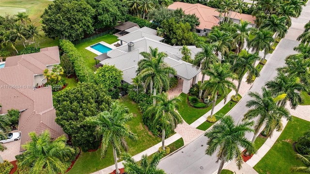 birds eye view of property with a residential view