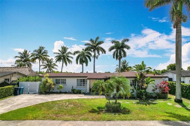 17931 NW 85th Ave, Hialeah, FL 33015 - single story home featuring a gate, stucco siding, and concrete driveway