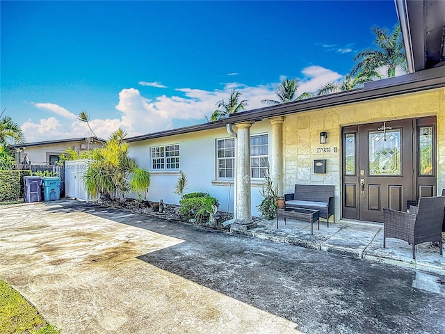 17931 NW 85th Ave, Hialeah, FL 33015 - view of front facade featuring stucco siding and a porch