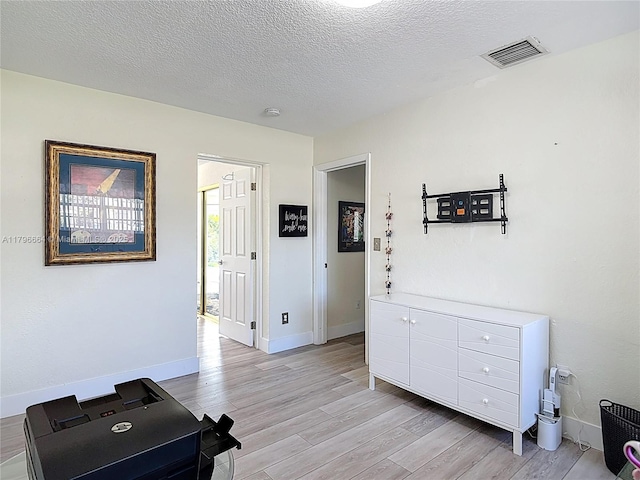 17931 NW 85th Ave, Hialeah, FL 33015 - office with light wood finished floors and a textured ceiling