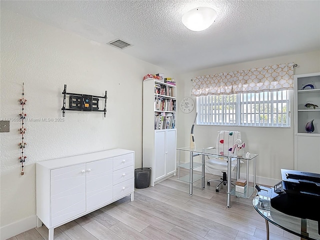 17931 NW 85th Ave, Hialeah, FL 33015 - office featuring a textured ceiling and light wood-style flooring