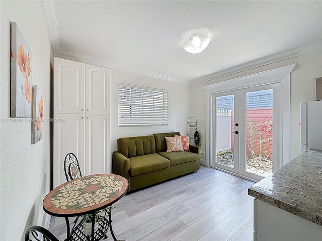 17931 NW 85th Ave, Hialeah, FL 33015 - living area featuring light wood-style floors, french doors, and crown molding