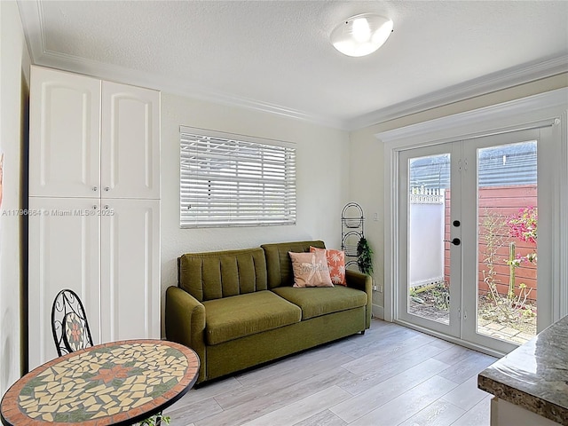 17931 NW 85th Ave, Hialeah, FL 33015 - living area with french doors, light wood-style flooring, and ornamental molding