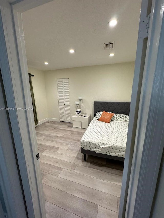 17931 NW 85th Ave, Hialeah, FL 33015 - bedroom with light wood-style floors and recessed lighting