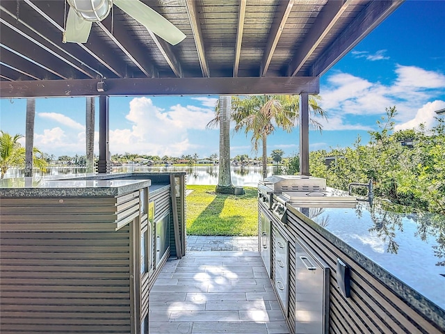 17931 NW 85th Ave, Hialeah, FL 33015 - wooden deck with a water view and a lawn