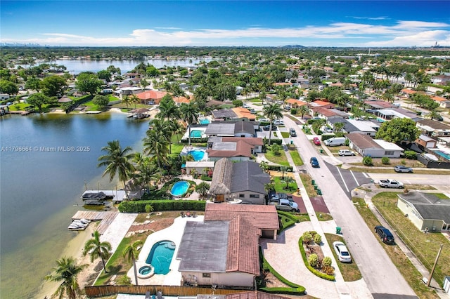 17931 NW 85th Ave, Hialeah, FL 33015 - aerial perspective of suburban area with a pool and a nearby body of water