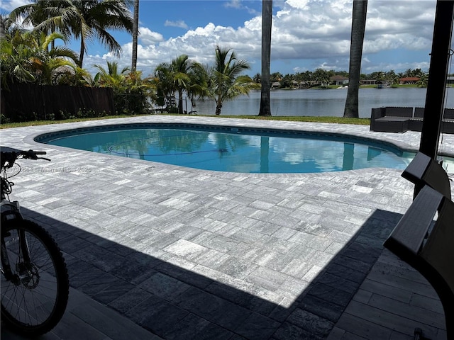 17931 NW 85th Ave, Hialeah, FL 33015 - outdoor pool with a patio, a water view, and an outdoor hangout area