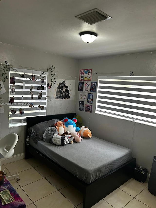 5718 Monroe St, Hollywood, FL 33023 - bedroom featuring light tile patterned floors and visible vents