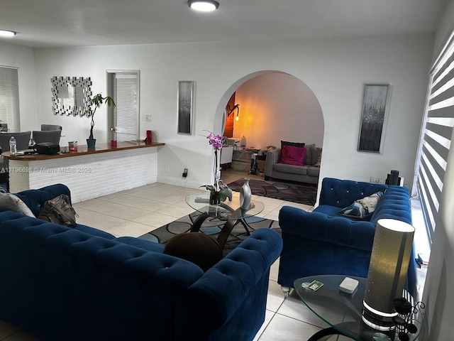 5718 Monroe St, Hollywood, FL 33023 - living room with arched walkways and tile patterned floors