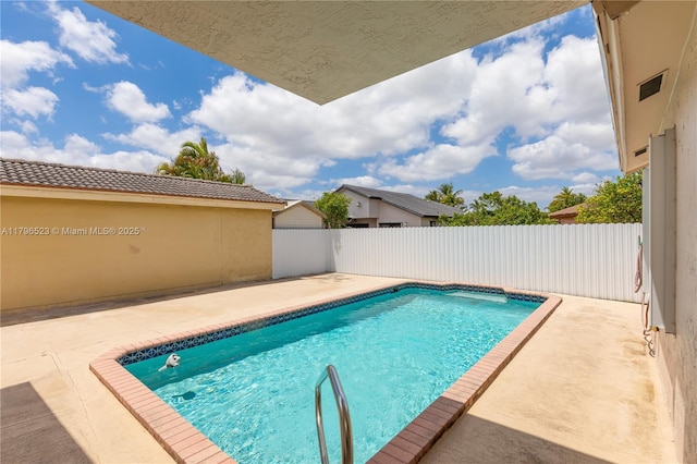 view of pool featuring fence, a patio, and a fenced in pool