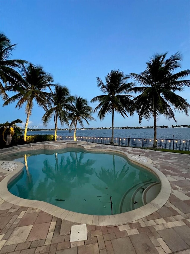 view of pool featuring a patio and a fenced in pool