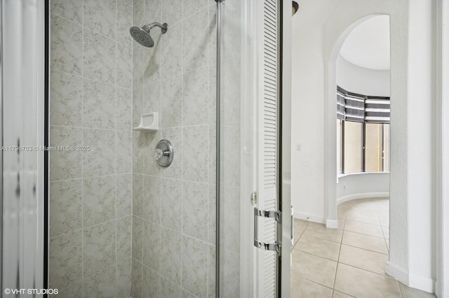 19058 SW 17th Ct, Miramar, FL 33029 - bathroom featuring tile patterned floors, a shower stall, and baseboards