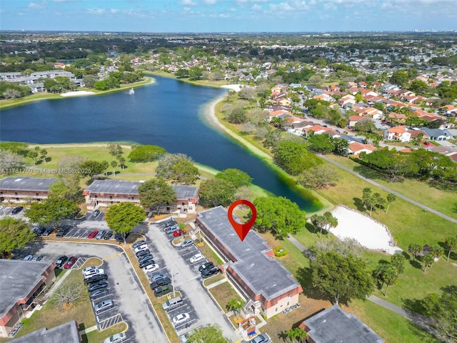 drone / aerial view with a water view