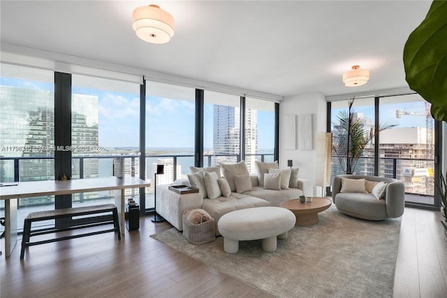1300 S Miami Ave Unit 3405, Miami, FL 33130 - living room featuring a water view, wood finished floors, and floor to ceiling windows