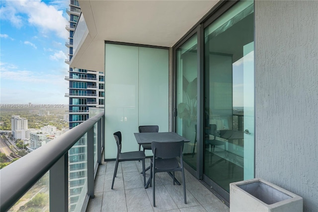 balcony featuring a city view