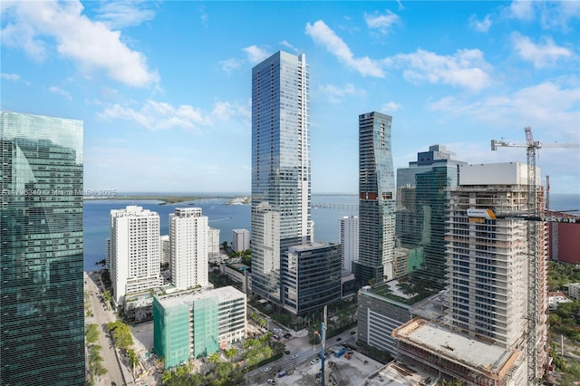 property's view of city featuring a water view