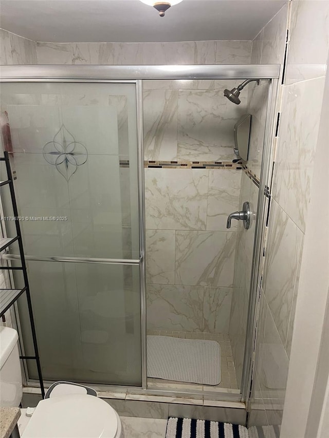 493 Camino Real Blvd, Clewiston, FL 33440 - bathroom with toilet and a shower stall