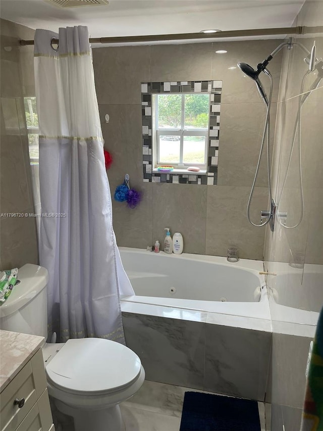 493 Camino Real Blvd, Clewiston, FL 33440 - full bathroom featuring a combined bath / shower with jetted tub, toilet, and vanity
