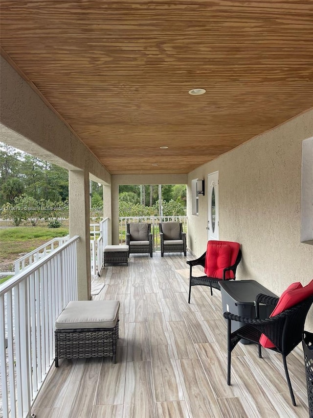 493 Camino Real Blvd, Clewiston, FL 33440 - wooden terrace with an outdoor living space