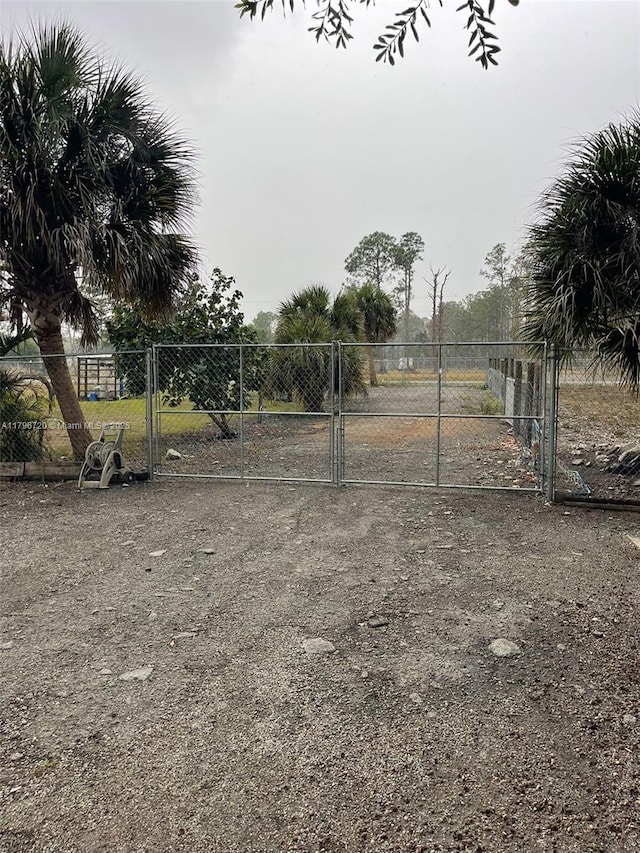 493 Camino Real Blvd, Clewiston, FL 33440 - view of yard with a gate